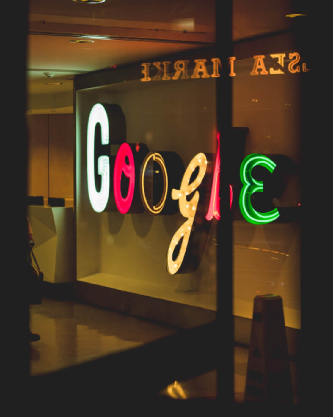 Google logo in neon sign in window ads interactive ad monetization platform