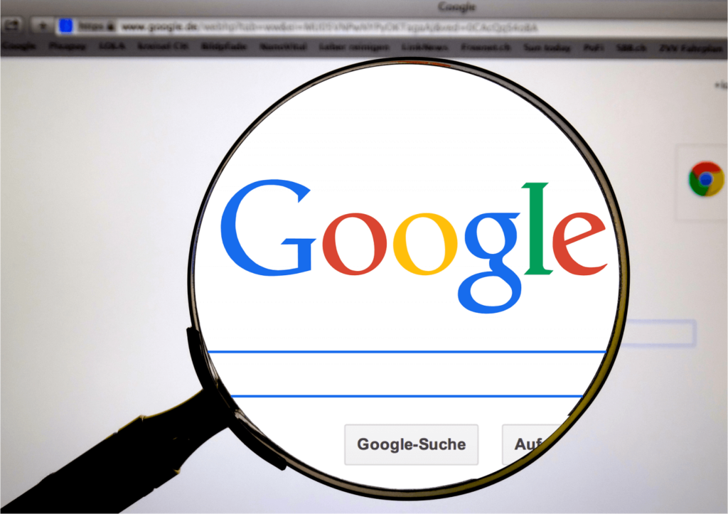 google logo under magnifier lens ads interactive ad monetization platform