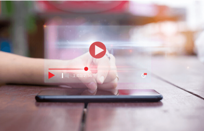 hand zooming on a video on mobile phone ads interactive ad monetization platform